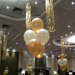 Gold and pearl balloons as a table centrepiece